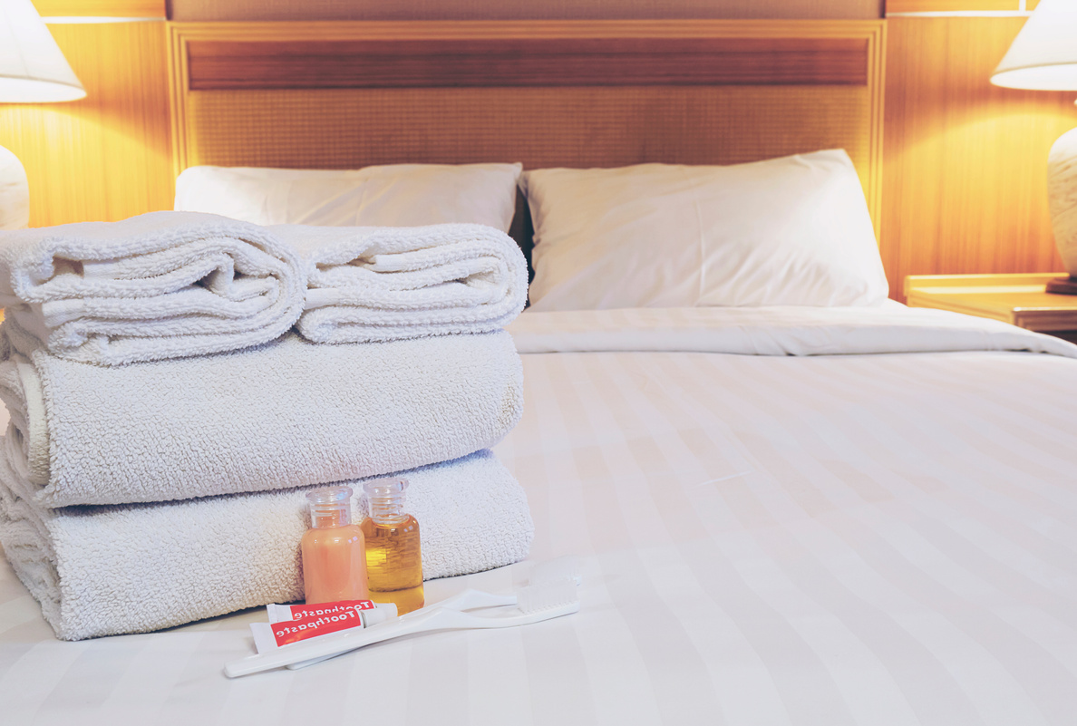 Fresh Towels on Hotel Bed